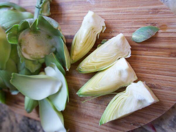 The artichokes do first need to be trimmed and sliced into quarters, a kitchen chore that is time-consuming—but rewarding at the same time. (Victoria de la Maza)