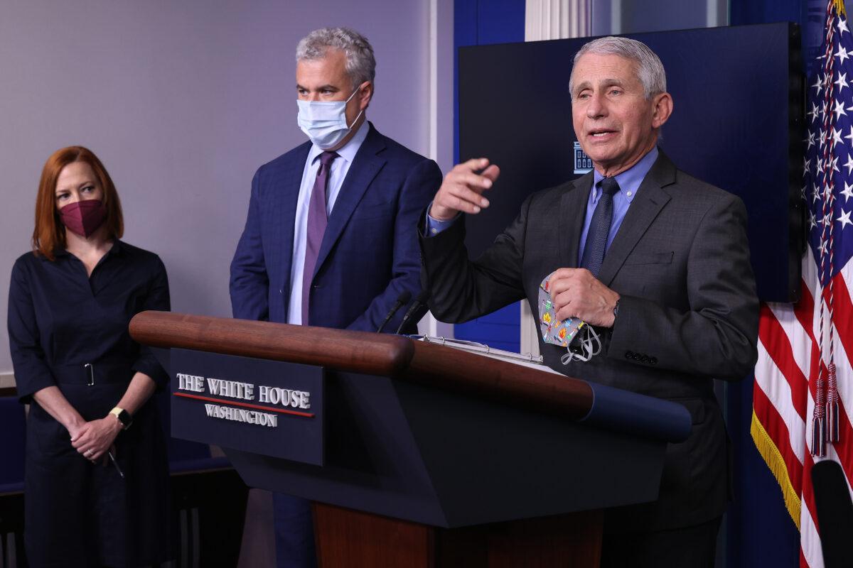 White House press secretary Jen Psaki, COVID-19 Response Coordinator Jeff Zients, and Director of the National Institute of Allergy and Infectious Diseases Dr. Anthony Fauci brief reporters at the White House in Washington on April 13, 2021. (Chip Somodevilla/Getty Images)