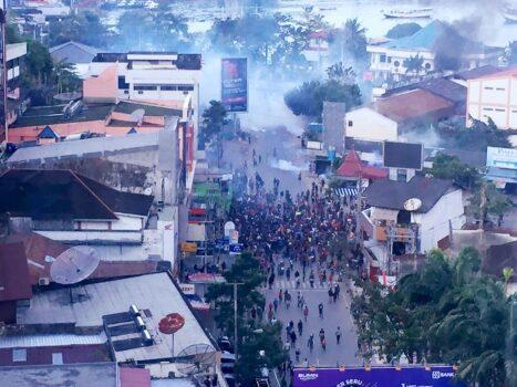 Hundreds of demonstrators marched near Papua's biggest city of Jayapura on August 29, 2019, where they set fire to a regional assembly building and hurled rocks at shops and hotels. (Cleine/AFP via Getty Images)