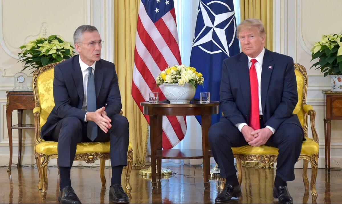 Jens Stoltenberg, Secretary-General of NATO speaks with U.S. President Donald Trump ahead of the NATO Leaders meeting at the NATO HQ in Watford, England, on Dec. 3, 2019. (NATO handout via Getty Images)