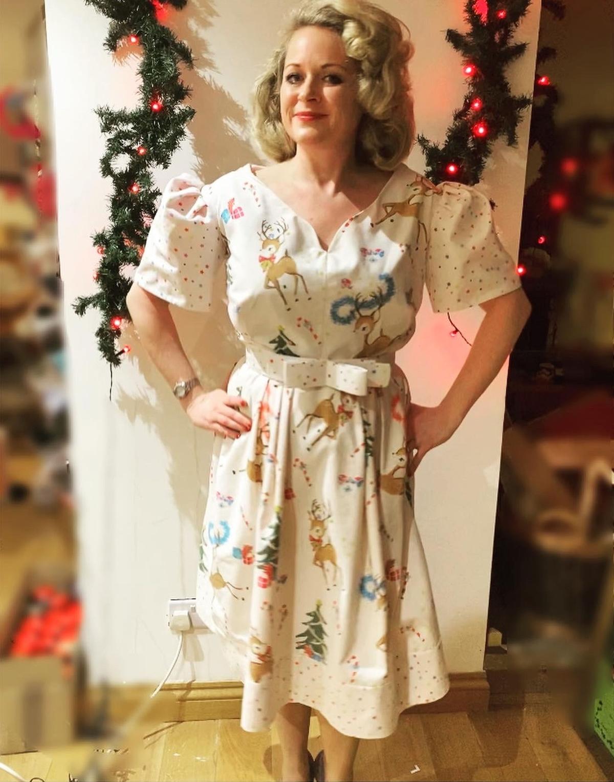 Rosie wearing a handmade dress made out of a charity shop duvet cover. (Kennedy News and Media)