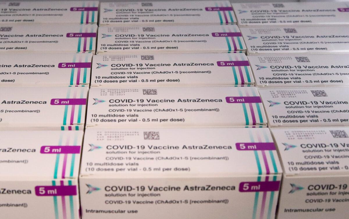 Boxes of AstraZeneca COVID-19 vaccine at a vaccination center in Ronquieres, Belgium, on April 6, 2021. (Yves Herman/Reuters)