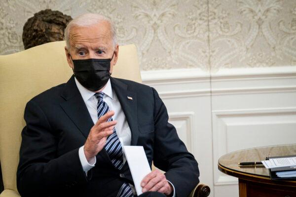 President Joe Biden speaks to the media during a meeting with the Congressional Black Caucus in the Oval Office at the White House in Washington, on April 13, 2021. (Pete Marovich/Pool/Getty Images)