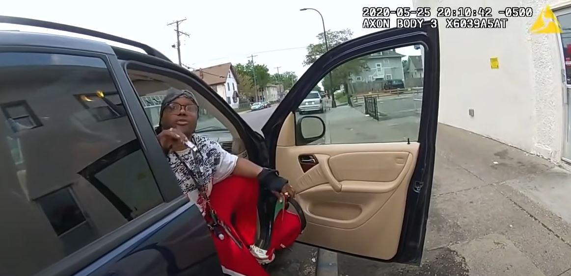 In this still image from police body camera video, Morries Hall is seen in the passenger seat of George Floyd's car in Minneapolis, Minn., on May 25, 2020. (Minneapolis Police Department)
