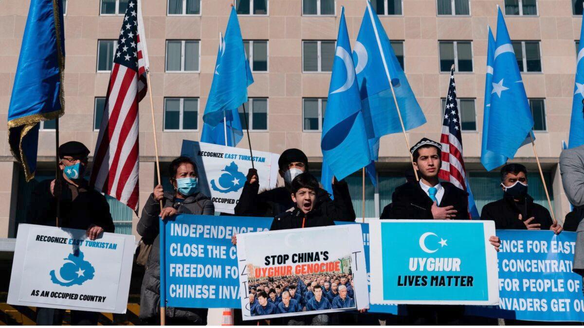 Uyghurs of the East Turkistan National Awakening Movement hold a rally outside the U.S. State Department calling on President Joe Biden to increase pressure on the Chinese Communist Party, in Washington, D.C. on Feb. 5, 2021. (Alex Edelman/AFP via Getty Images)