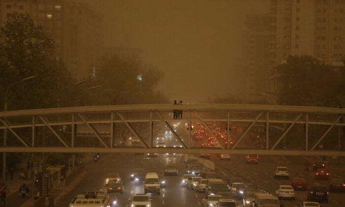 Beijing Skies Turn Yellow as Sand, Dust Engulf Chinese Capital
