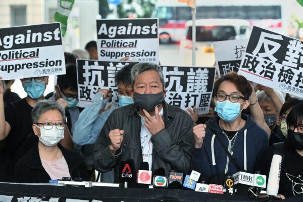 Margaret Ng, Lee Cheuk-yan, and Figo Chan, the convener of local pro-democracy group Civil Human Rights Front, outside of the West Kowloon court building in Hong Kong on April 16, 2021. (Sung Pi-lung/The Epoch Times)