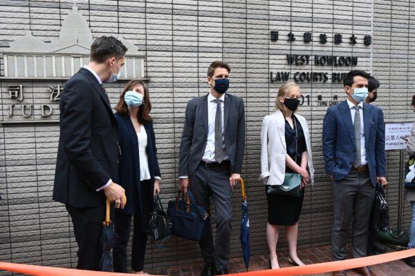 (L-R) Consular representatives from Australia, Canada, Sweden, France, and the Netherlands, outside of the West Kowloon court building in Hong Kong on April 16, 2021. (Sung Pi-lung/The Epoch Times)