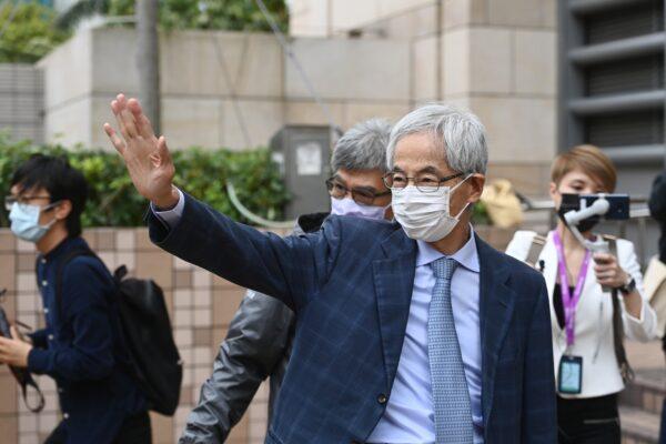 Martin Lee, an 82-year-old barrister who has been dubbed the “father of democracy” in Hong Kong, waves to supporters outside of the West Kowloon court buliding in Hong Kong on April 16, 2021. (Song Pi-lung/The Epoch Times)