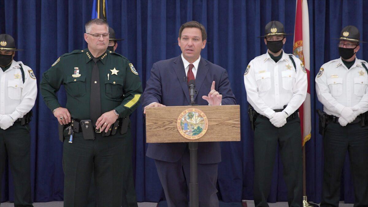 Gov. Ron DeSantis delivers remarks at a press conference in Titusville, Fla., on April 1, 2021. (Screenshot via Epoch Times)