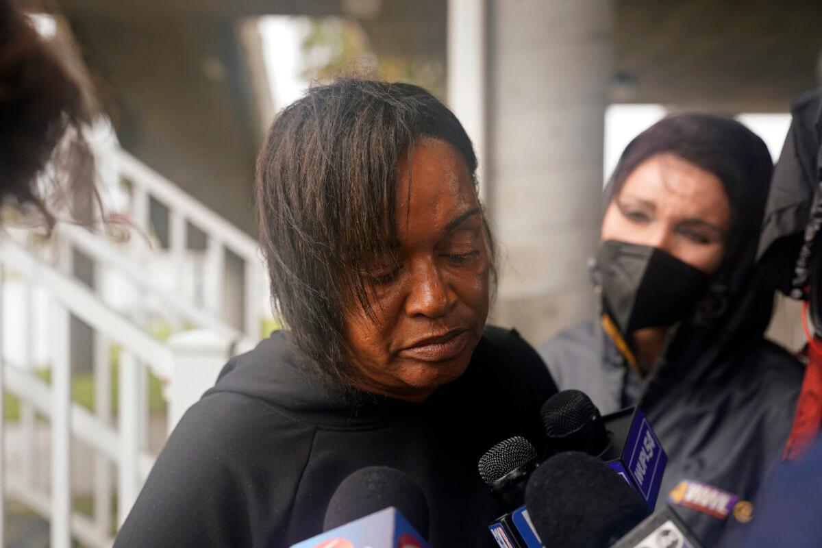 Dawn Saddler, sister of missing crewmember Gregory Walcott, talks to reporters as she leaves a briefing for family members by Coast Guard and NTSB officials in Port Fouchon, La., Friday, April 16, 2021. (Gerald Herbert/AP)