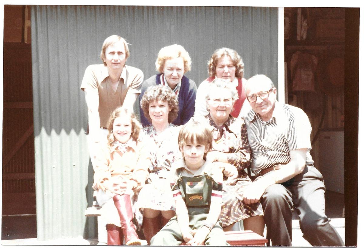 (Clockwise from top L) The author's father, Aunt Ausma, Aunt Lidia, grandfather Dzeda, grandmother Buba, younger brother Matthew, mother, and the author herself. (Courtesy of Emma Buls)