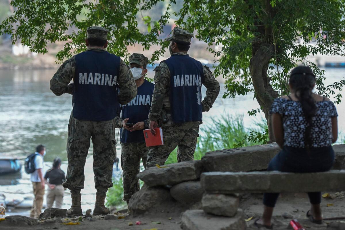 Mexican Marines patrol at the banks of the Suchiate River in Ciudad Hidalgo, Chiapas state, Mexico, border with Tecun Uman, Guatemala, on Jan. 19, 2021. (Isaac Guzman/AFP via Getty Images)