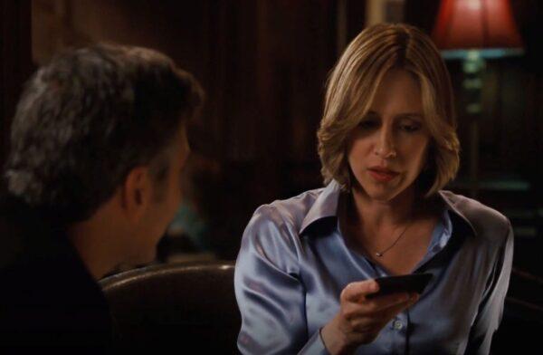 Ryan (George Clooney) and Alex (Vera Farmiga) both travel and lot for work, and they hit it off. (Paramount Pictures)