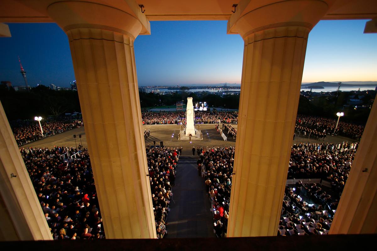 People surround the Cenotaph for the Dawn Service at the Auckland War Memorial Museum on April 25, 2017. (Phil Walter/Getty Images)