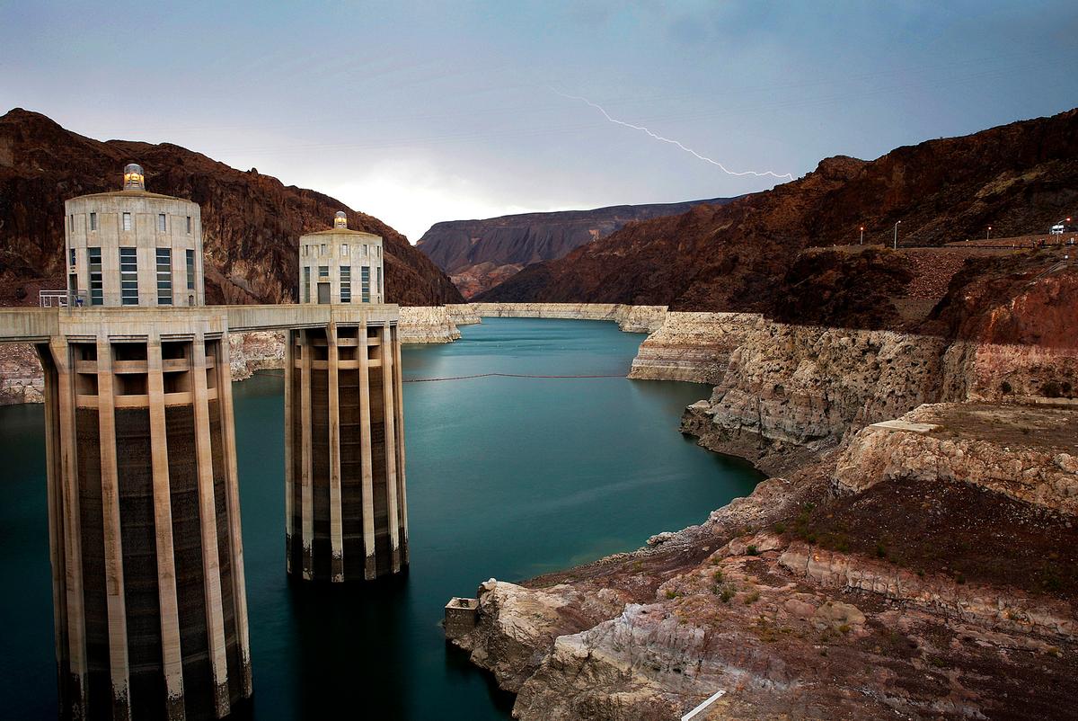 Lightning strikes over Lake Mead near Hoover Dam that impounds Colorado River water at the Lake Mead National Recreation Area in Ariz., on July 28, 2014. (John Locher/AP Photo)