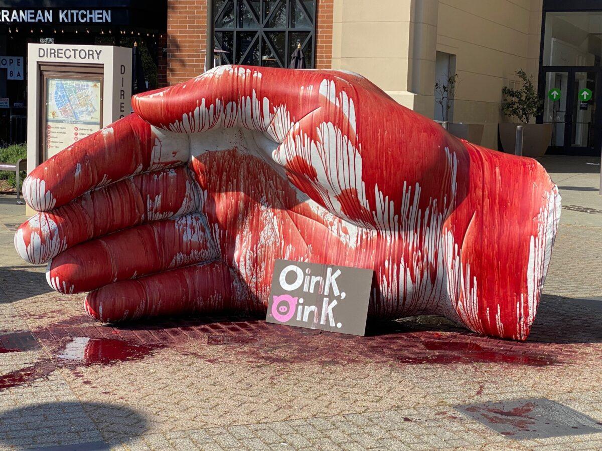A hand statue with blood and a sign in front of it in Santa Rosa, Calif., on April 17, 2021. (Santa Rosa Police Department)