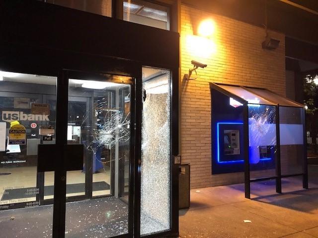 A U.S. Bank was among the establishments damaged in rioting in Portland, Ore., on April 19, 2021. (Portland Police Bureau)