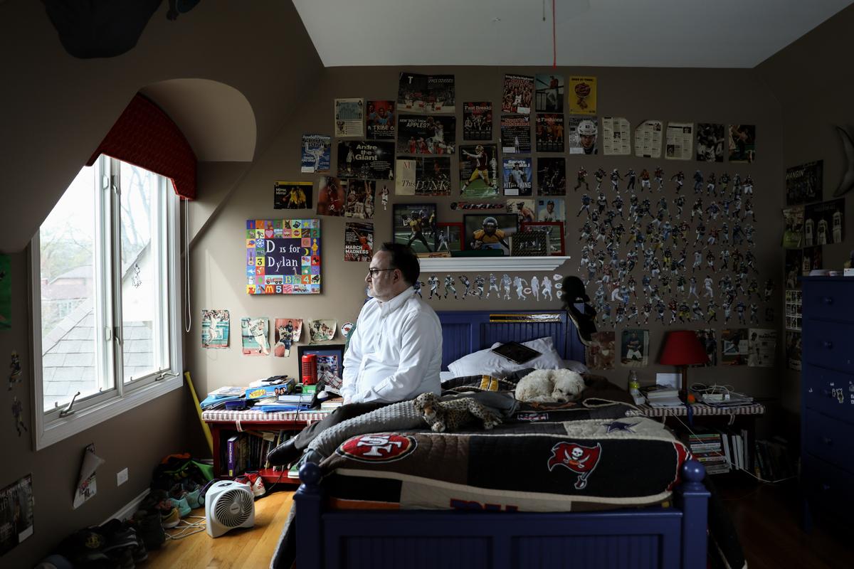 Chris Buckner, in his son’s room, Dylan Buckner who committed suicide due to his depression being amplified by the lockdowns, at his home in Northbrook, Ill., on April 16, 2021. (Samira Bouaou/The Epoch Times)