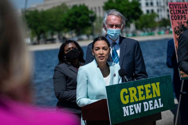 Rep. Alexandria Ocasio-Cortez (D-N.Y.) speaks at a news conference held to reintroduce the Green New Deal, in Washington on April 20, 2021. (Sarah Silbiger/Getty Images)