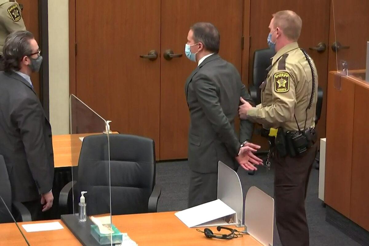 Former Minneapolis police officer Derek Chauvin is led away in handcuffs after a jury found him guilty of all charges in his trial for second-degree murder, third-degree murder, and second-degree manslaughter in the death of George Floyd in Minneapolis, on April 20, 2021. (Pool via Reuters)