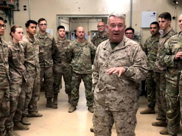 Marine General Kenneth McKenzie, head of U.S. Central Command, speaks with U.S. troops while visiting Forward Operating Base Fenty in Jalalabad, Afghanistan, on Sept. 9, 2019. (Phil Stewart/Reuters)