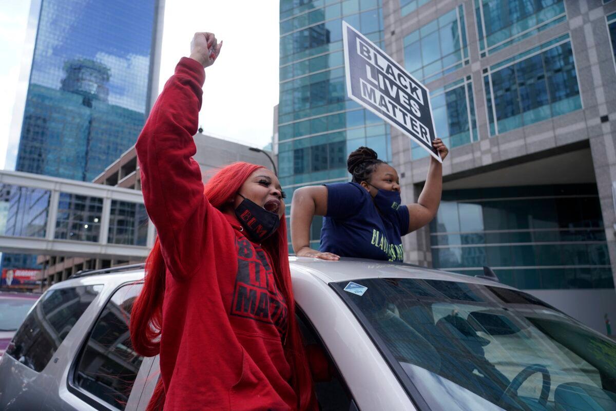 People cheer after a guilty verdict was announced at the trial of former Minneapolis police officer Derek Chauvin for the 2020 death of George Floyd, in Minneapolis, on April 20, 2021. (Morry Gash/AP Photo)
