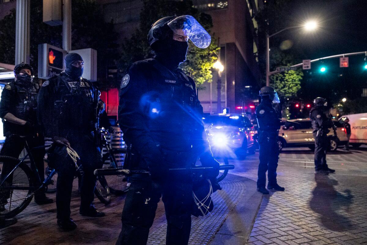 Portland police officers in downtown Portland, Ore., on April 20, 2021. (Paula Bronstein/Getty Images)