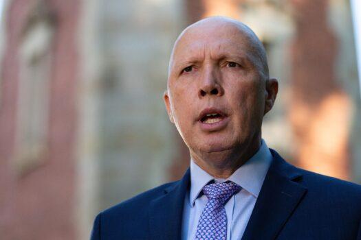 Australian Defence Minister Peter Dutton addresses media in front of the Subiaco War Memorial in Perth, Australia, on April 19, 2021. (AAP Image/Richard Wainwright)