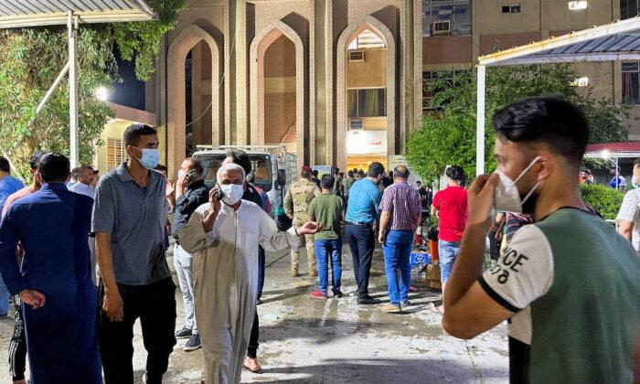 Fire From Oxygen Tank Blast in Baghdad COVID-19 Hospital Kills 82
