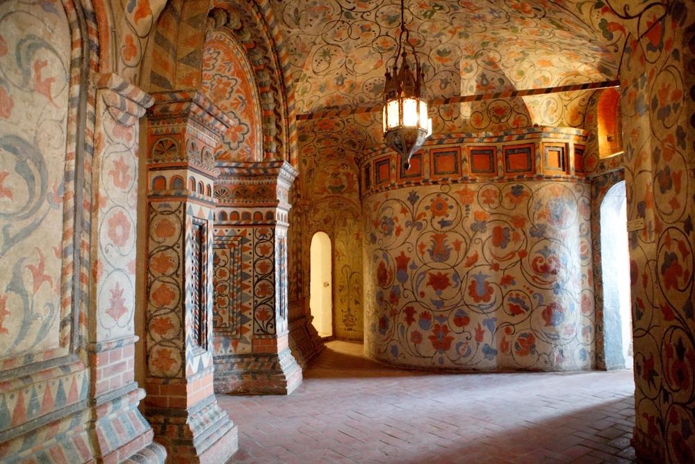 Colorful murals cover the vaulted galleries that connect the chapels. (Olga Golovkina/Shutterstock)