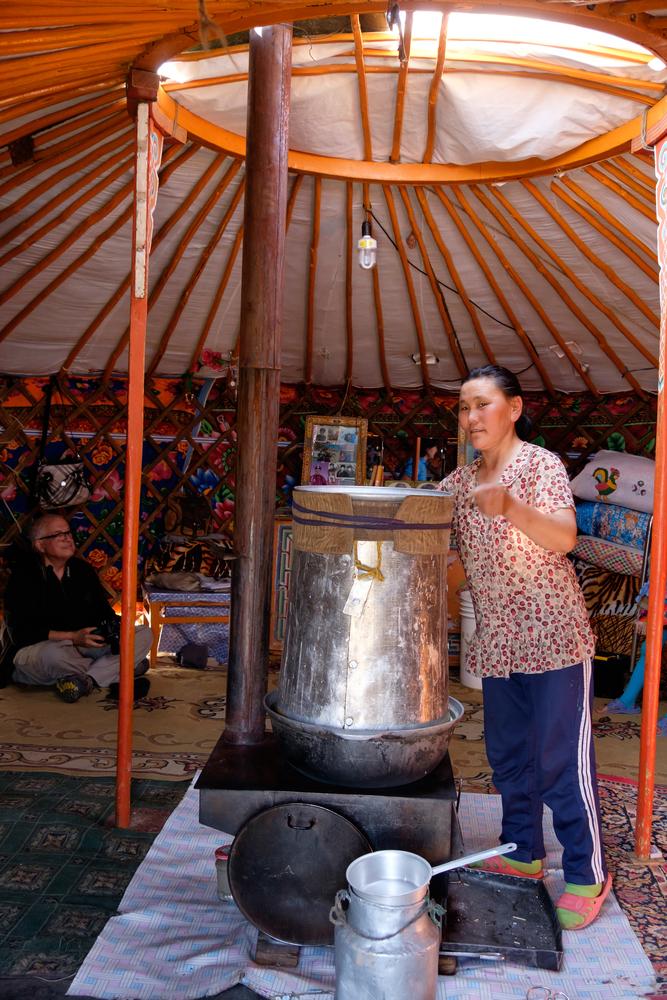 Preparation of airag, fermented mare's milk, the traditional and national beverage of Mongolia, inside a ger. (Emily Marie Wilson/Shutterstock)