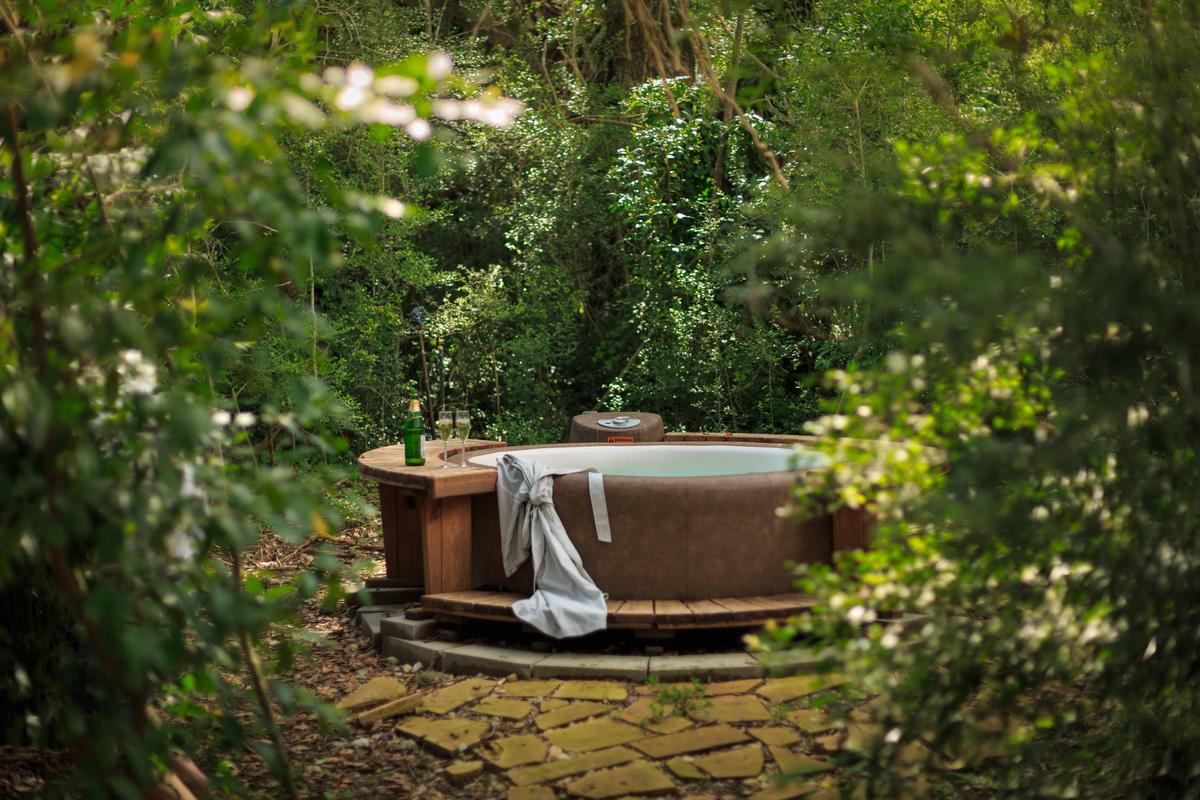 Some accommodations at BlissWood include an outdoor hot tub. (Jumping Rocks Photography)