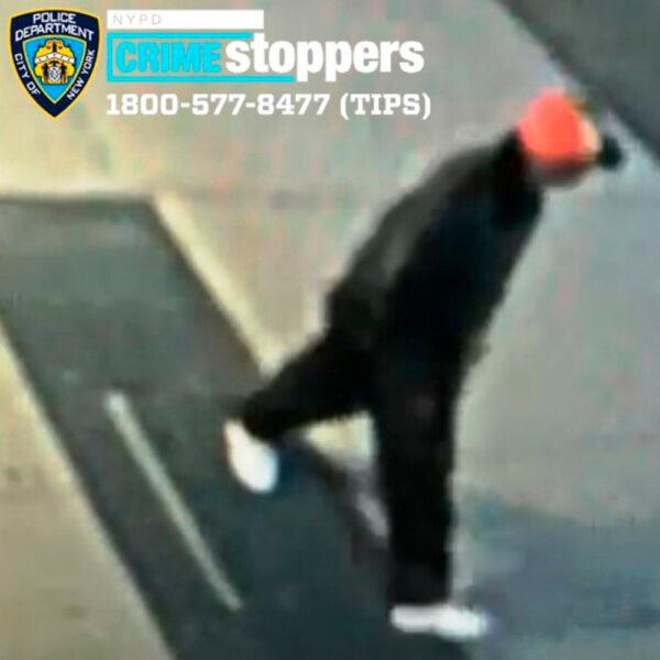 This Friday, April 23, 2021 image from surveillance video made available by the New York City Police Department shows an unidentified individual police who are seeking after a 61-year-old Asian man was attacked in the East Harlem neighborhood of New York. (NYPD via AP)
