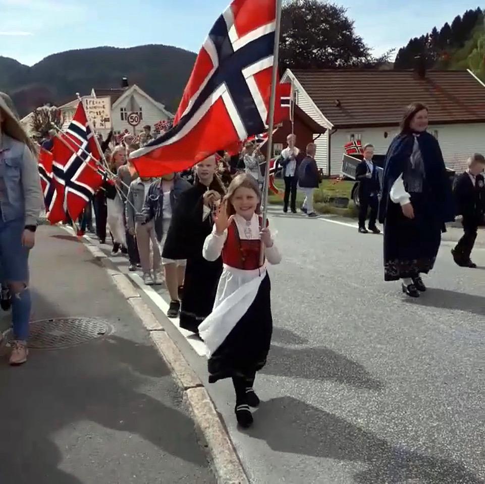 The author's second cousin Sofie Charlotte leading the Syttende Mai children’s parade in Kvinesdal, Norway. (Courtesy of Charlotte McDonald)