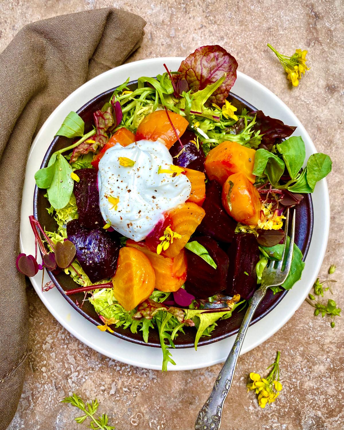 Dollop savory whipped ricotta on this roasted beet and spring greens salad. (Lynda Balslev for Tastefood)
