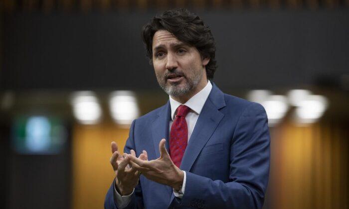 Prime Minister Justin Trudeau responds to a question during a question period in the House of Commons on April 28, 2021. (The Canadian Press/Adrian Wyld)