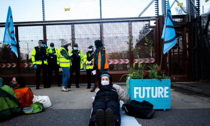 Police Attempt to Remove Climate Activists Blocking Nuclear Base