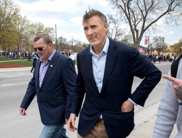 People's Party of Canada Leader Maxime Bernier leaves a protest against COVID-19 restrictions in Peterborough, Ont., on April 24, 2021. (The Canadian Press/Fred Thornhill)