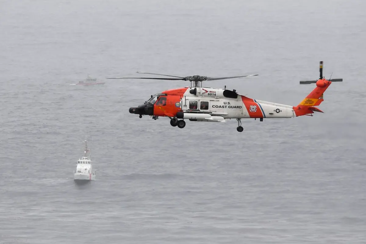 A U.S. Coast Guard helicopter off the San Diego coast on May 2, 2021, In a file photo. (Denis Poroy/AP Photo)