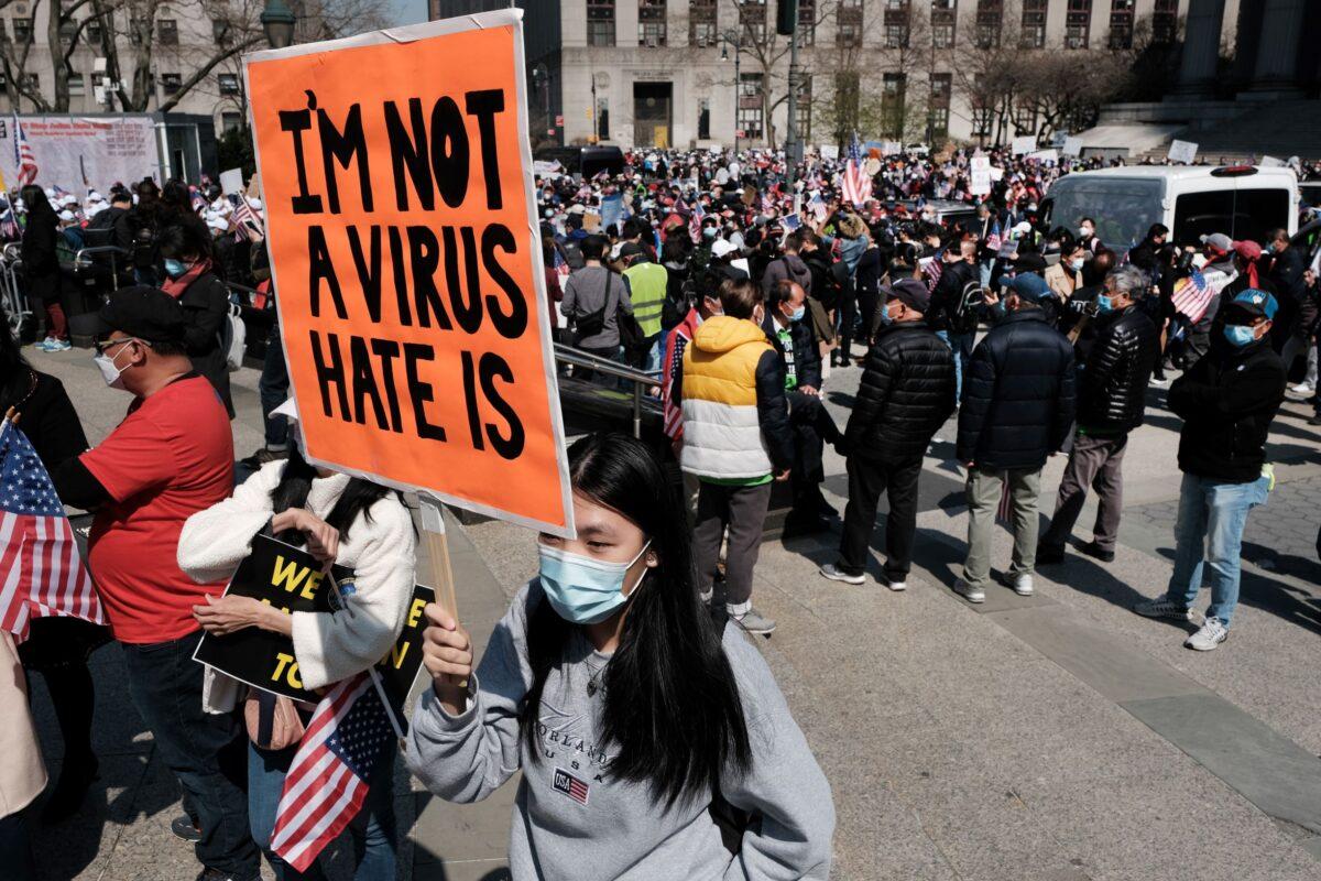 People participate in a protest to demand an end to anti-Asian violence in New York City on April 4, 2021. (Spencer Platt/Getty Images)