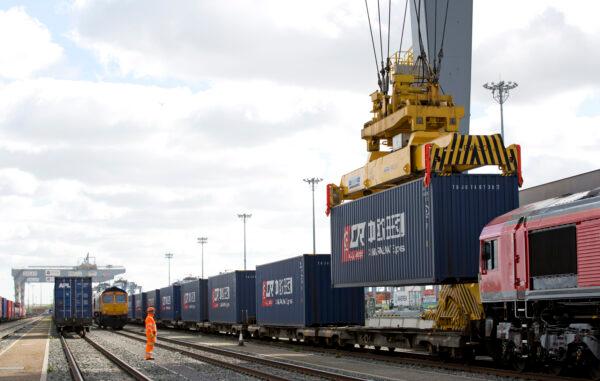A freight train transporting containers laden with goods from the UK, is prepared ahead of departure from DP World London Gateway's rail freight depot in Corringham, east of London, on April 10, 2017. (ISABEL INFANTES/AFP via Getty Images)