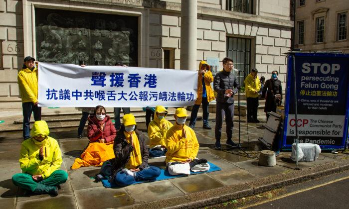 Simon Cheng, a pro-democracy activist from Hong Kong, speaks during a rally opposite the Chinese embassy in London after Ta Kun Pao, a HK media outlet widely regarded as a mouthpiece of the CCP, published a series of slanderous articles on Falun Gong, in London on May 4, 2021. (Roger Luo/NTD)