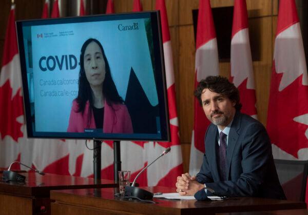 Chief Public Health Officer of Canada Theresa Tam appears via video conference as Prime Minister Justin Trudeau attends a news conference in Ottawa on May 4, 2021. (The Canadian Press/Adrian Wyld)
