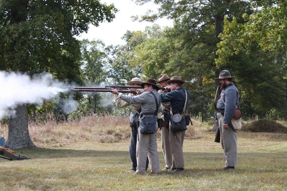 Military reenactors fight in a living history program at Richmond National Battlefield Park. (NPS)
