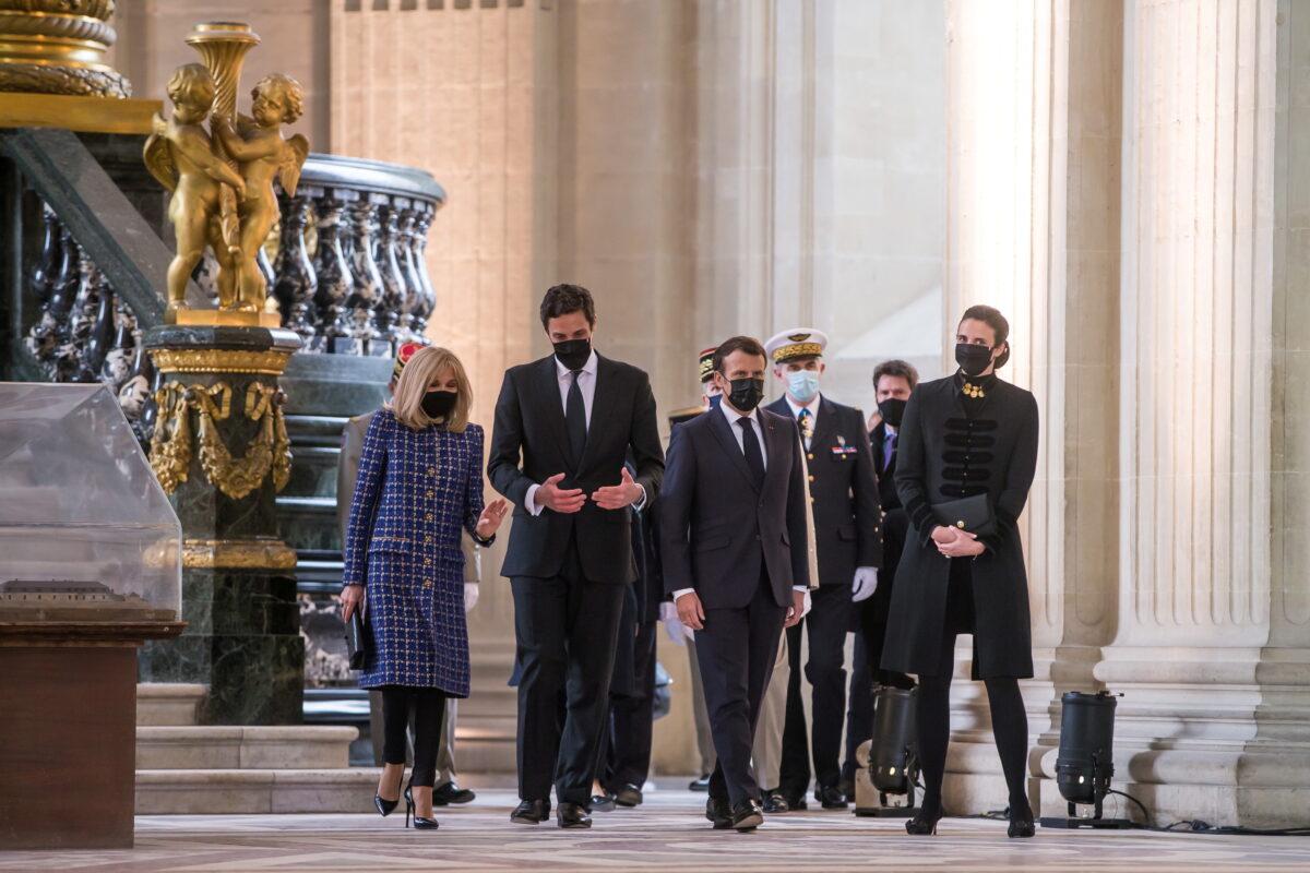 French President Emmanuel Macron and his wife Brigitte Macron speak with Jean-Christophe Napoleon Bonaparte and his wife Olympia von und zu Arco-Zinneberg as they leave after a ceremony to commemorate the 200th anniversary of Napoleon Bonaparte's death, at the Hotel des Invalides in Paris, France, May 5, 2021. (Christophe Petit Tesson/Reuters)