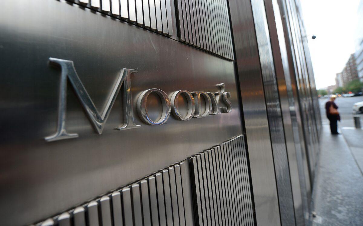 A sign for the ratings firm Moody's stands in front of the company's headquarters in New York in this file photo. (EMMANUEL DUNAND/AFP via Getty Images)