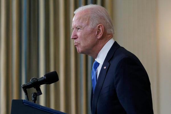 President Joe Biden takes questions from reporters in the State Dining Room of the White House in Washington on May 5, 2021. (Evan Vucci/AP Photo)