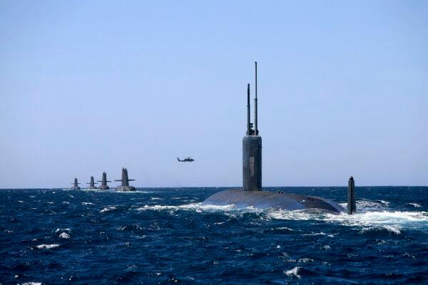 A picture of Australia's current Collins Class Submarines joined in formation by U.S. Navy submarine USS Santa Fe in the West Australian Exercise Area in February 2019. (Courtesy of LSIS Richard Cordell/Department of Defense)