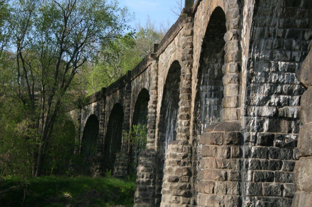 The graceful curve of the Thomas Viaduct was an untried design when construction began in 1833. Latrobe loaded the bridge with locomotives when it was completed to prove that his design was safe. (Bob Kirchman)
